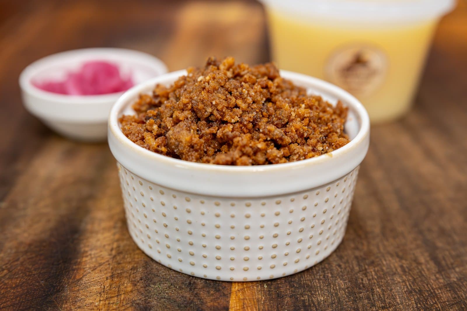 Beef cracklin' in a white ramekin