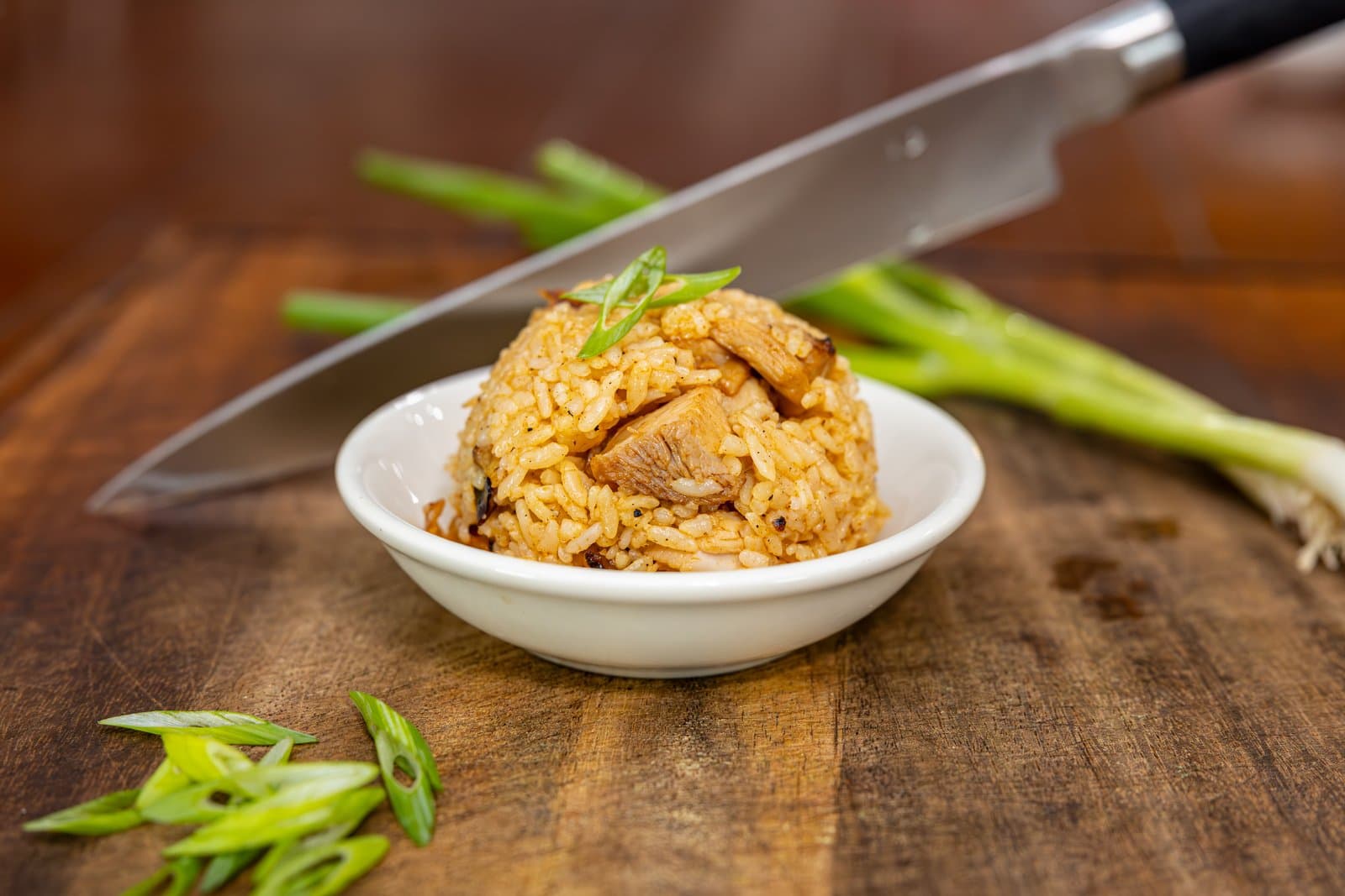 New Orleans grilled chicken rice topped with scallions
